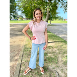 Get ready for your new favorite top - the Tiff Top! This soft pink beauty features cap sleeves and is perfect for everyday wear. Comfort and style all in one - what more could you ask for?  Olivia is wearing a size small.