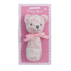 Two teddy bear rattles in packaging, one blue and one pink, on a white background.