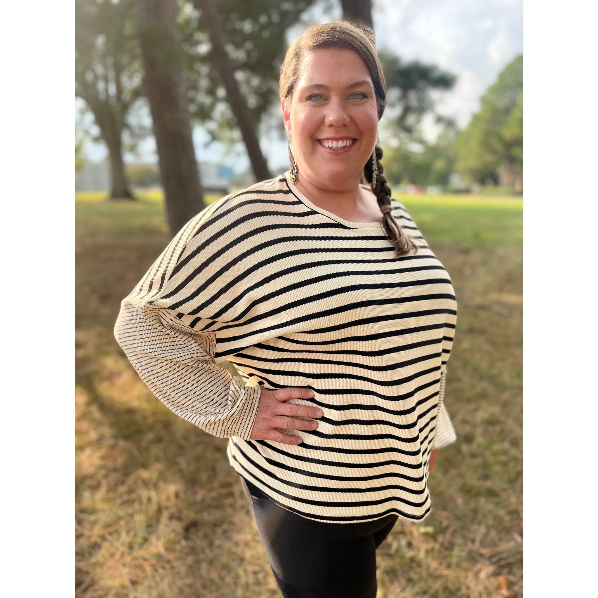 Look chic and fashionable with the Marla Top! This striped top features long, balloon sleeves for a flattering fit that will turn heads. The Marla Top is perfect for day-to-night style that is always on trend. What are you waiting for? Embrace the look now!  Zoe is wearing a size 2xl.
