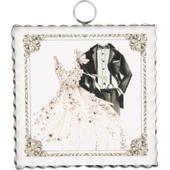 Decorative ornament with a wedding dress and tuxedo on a white background
