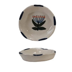Set of ceramic bowls with floral designs on a white background