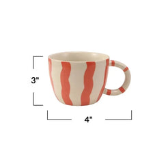 Four striped ceramic mugs with measurements on a white background