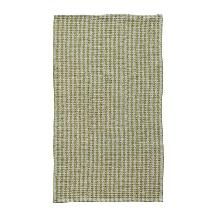 Three woven towels with different patterns on a white background