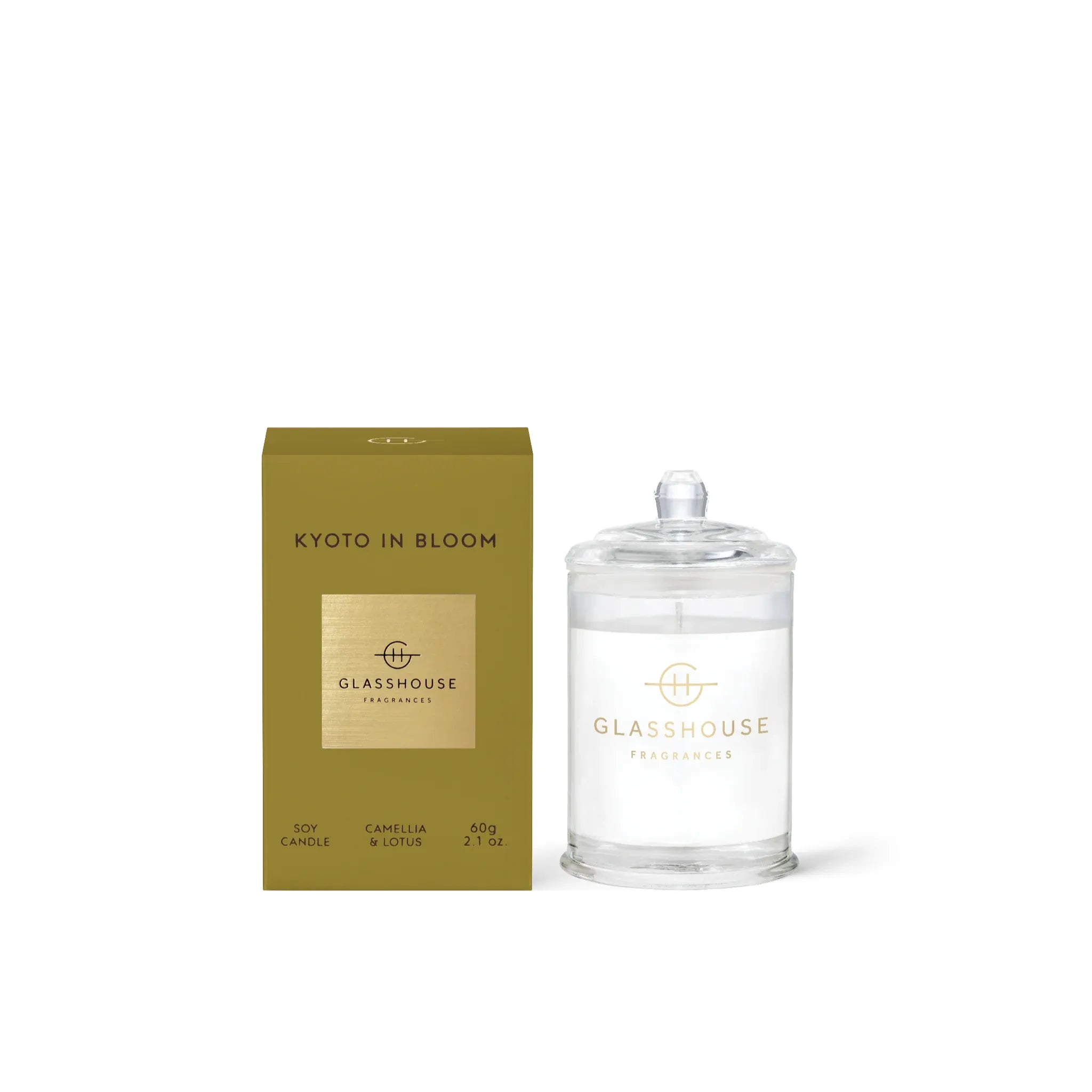 Glasshouse Fragrances candle and packaging on a white background with 'Bustle' logo.