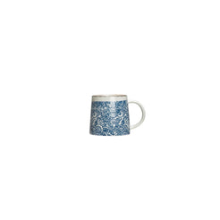 White mug with blue floral pattern on a white background